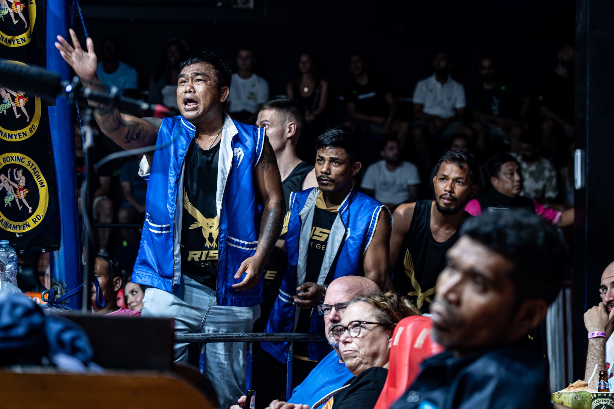 Spectators watching a Muay Thai fight in Thailand